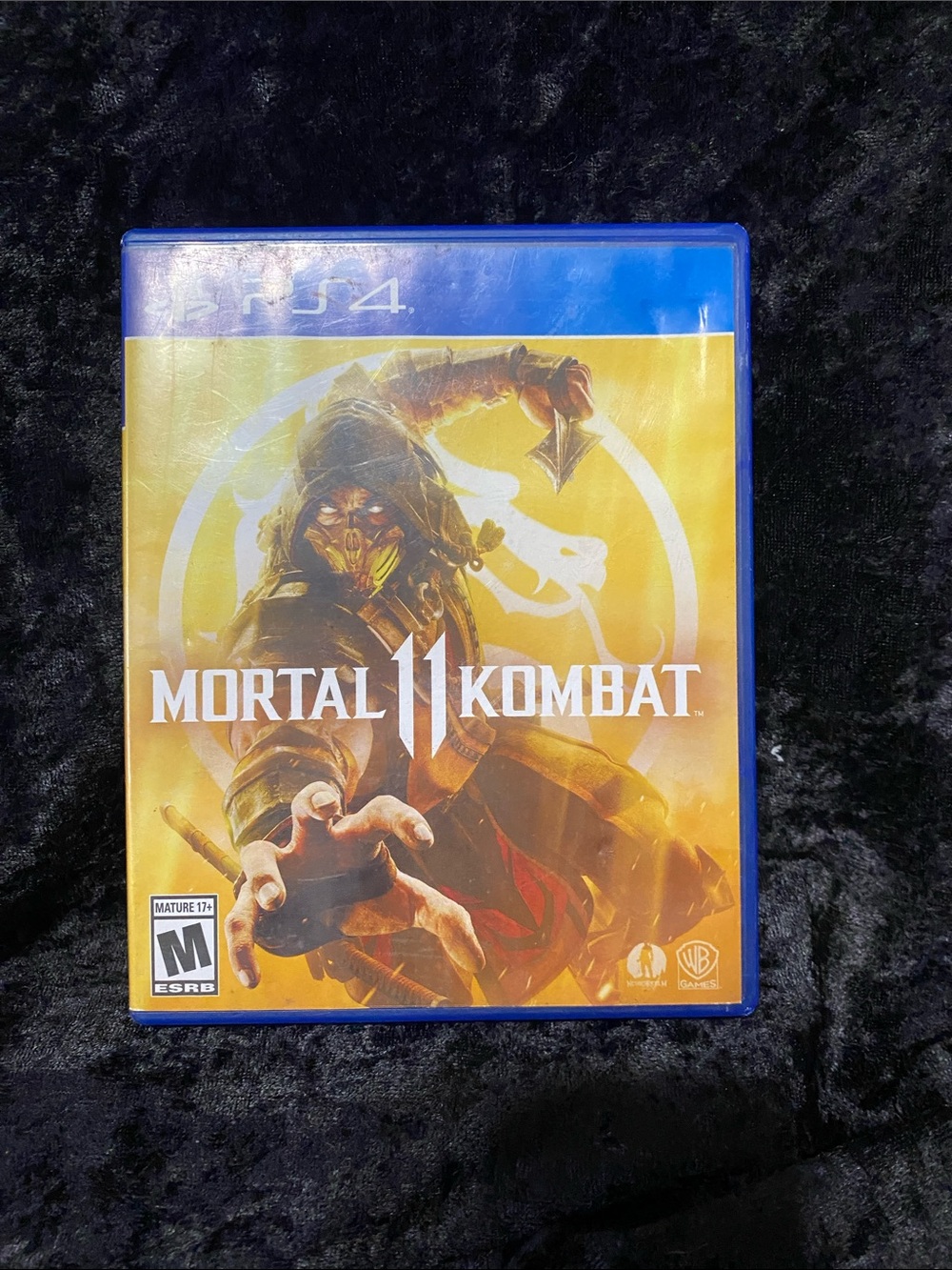 Sony PS4 Game Case with Blue Shell and Yellow Accents